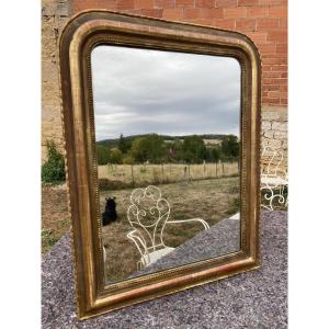 Miroir ancien Louis-Philippe doré à la feuille d’or