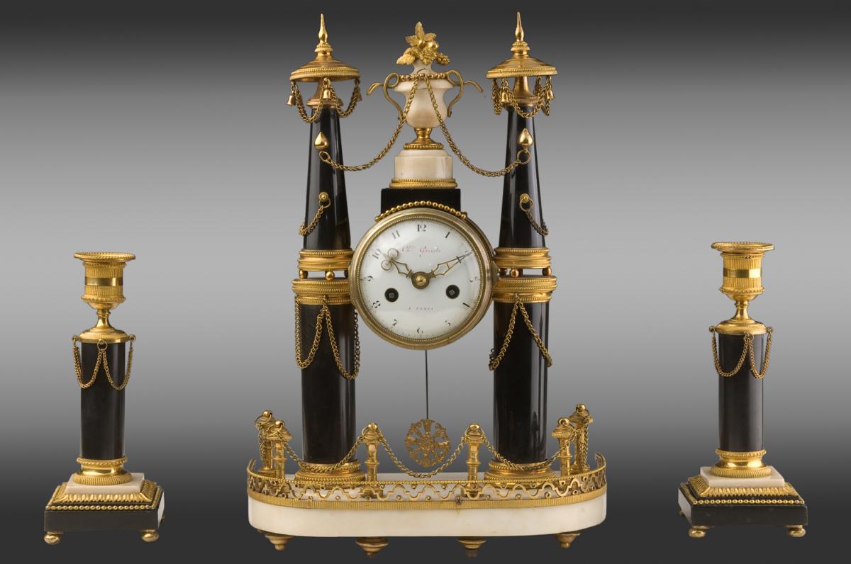 Pendulum And Its Bronze And Marble Candlesticks. Louis XVI