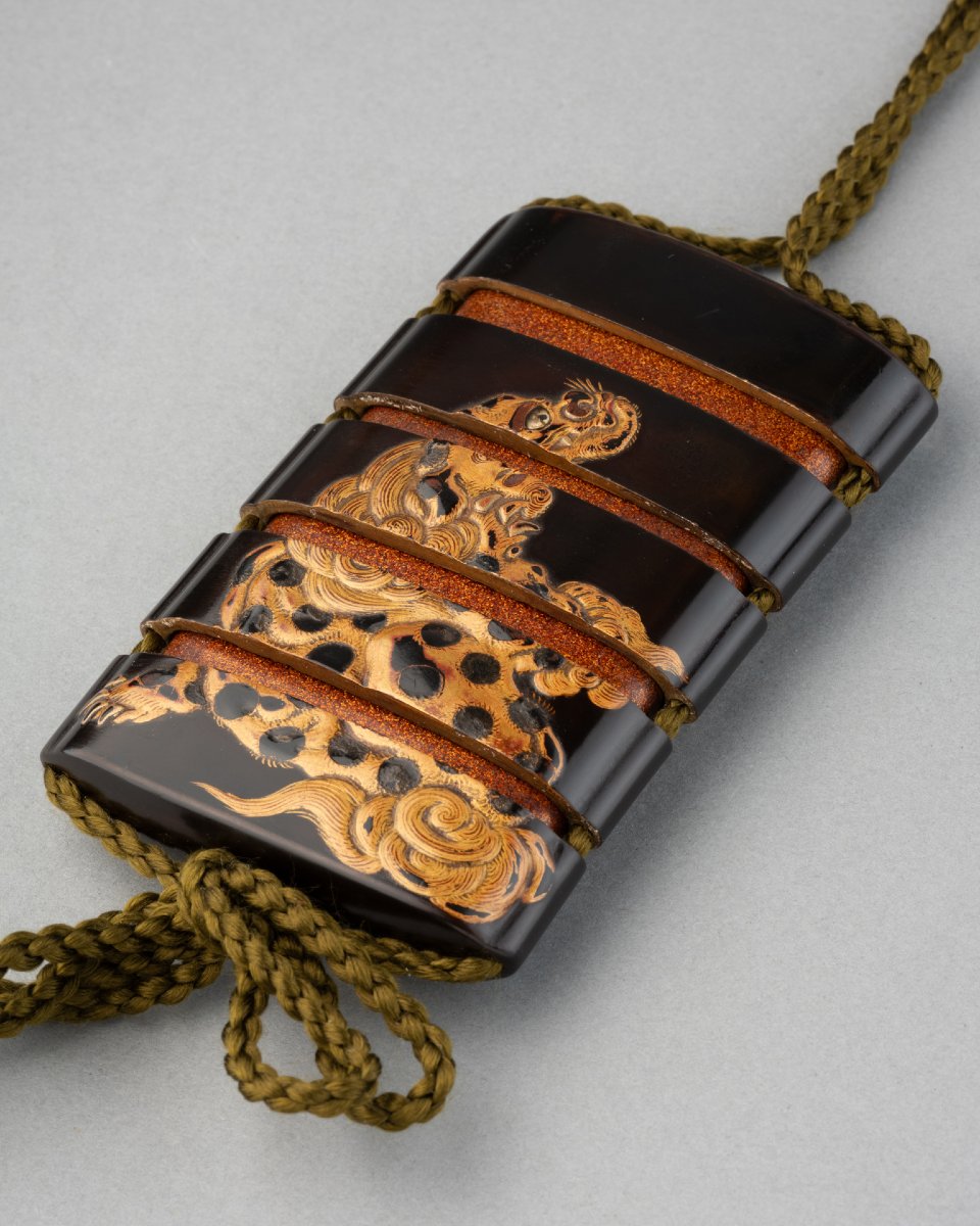 Inro With A Raised Shishi Lacquer Design On A Black Background. Edo Period, Japan-photo-1
