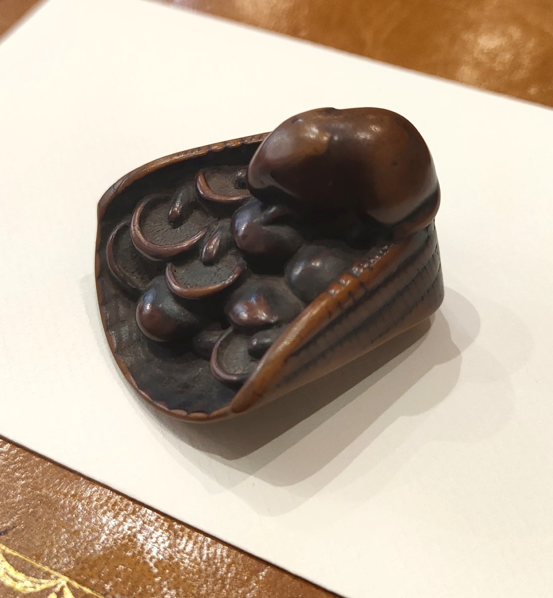 A Carved Boxwood Netsuke Depicting A Basket Filled With Mushrooms And Mice. Edo Period, Japan-photo-1