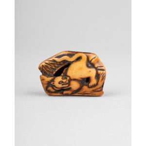 Carved Stag-antler Netsuke Depicting A Tiger Among Bamboo. Edo And Meiji, Japan