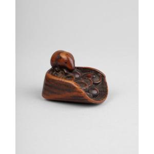 A Carved Boxwood Netsuke Depicting A Basket Filled With Mushrooms And Mice. Edo Period, Japan