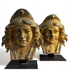 Pair Of Golden Lead Masks