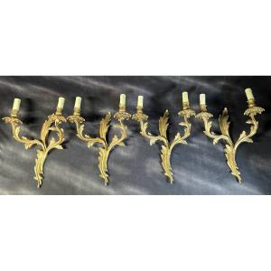 Ensemble de 4 appliques murales en bronze doré – style Louis XV – XXe siècle