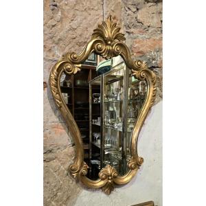 Miroir en bois sculpté et doré, style Louis XV - 94 cm 