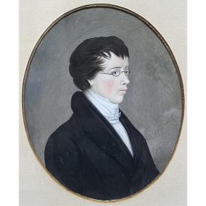 Ecole allemande (?) du début du XIXe siècle,  Portrait d'un jeune homme portant des lunettes,  