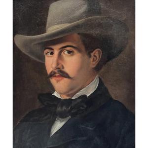 École française du XIXe siècle Portrait d'un jeune homme au chapeau, huile sur toile