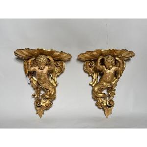 Paire de console d’applique en bois doré du XIX ème siècle. 