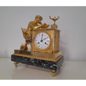 Pendule liseuse bronze dore epoque empire début xixeme siecle