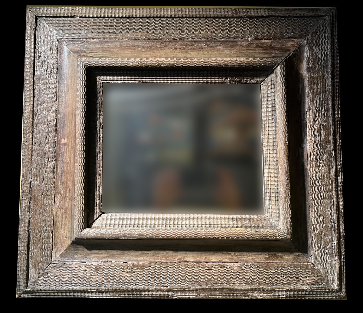 Miroir avec encadrement en bois guilloché