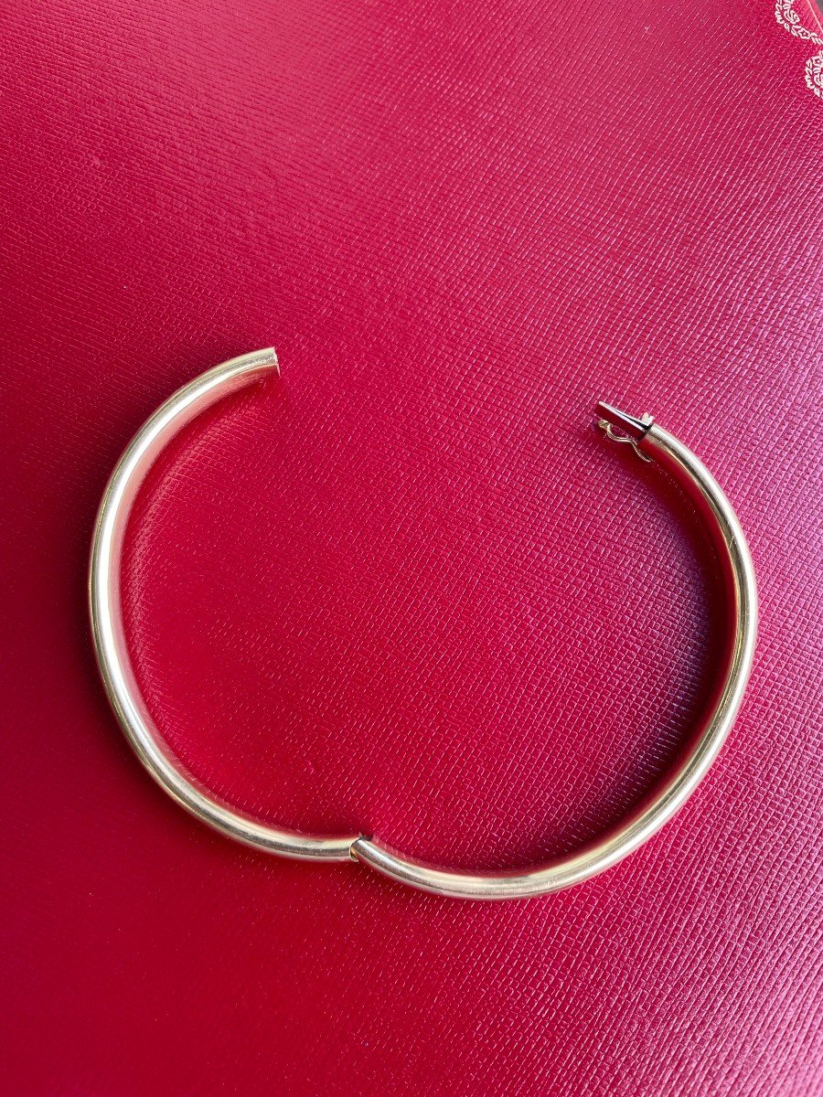 BRACELET jonc ouvrant en or jaune 750/°°° (18K). Fermoir en 8 huit de sécurité.16,66 gr -photo-2