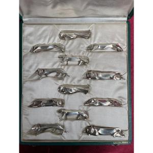 EDOUARD-MARCEL SANDOZ (1881-1971) GALLIA Suite de douze porte-couteaux animaliers métal argenté