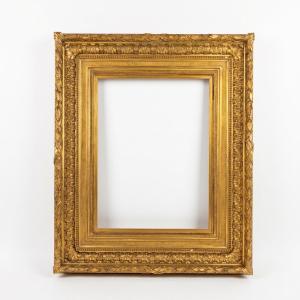 Grand cadre en bois et stuc doré XIXe siècle style Louis XIV pour chassis 62 x 46,8 cm
