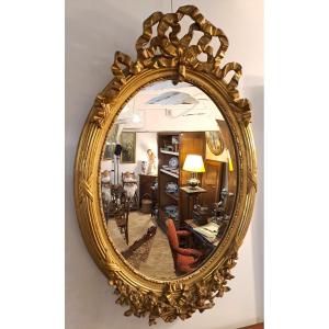 Oval Mirror In Golden Stuccoed Wood, 19th Century