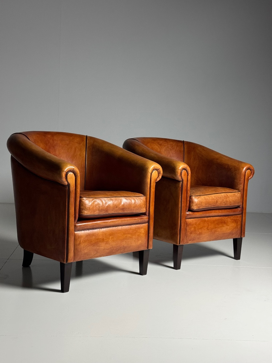 Lot de 2 fauteuils club en cuir de mouton 