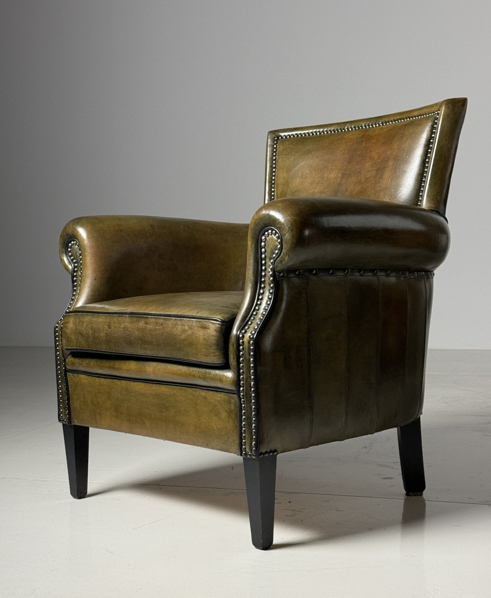 Fauteuil club en cuir de mouton vert