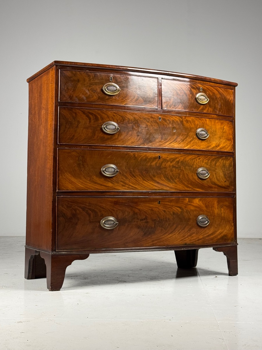 Mahogany Chest Of Drawers With A Curved Front 