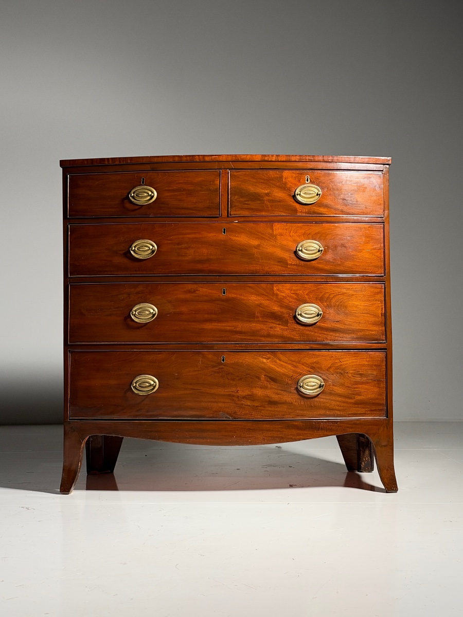 English Mahogany Chest Of Drawers With A Curved Front