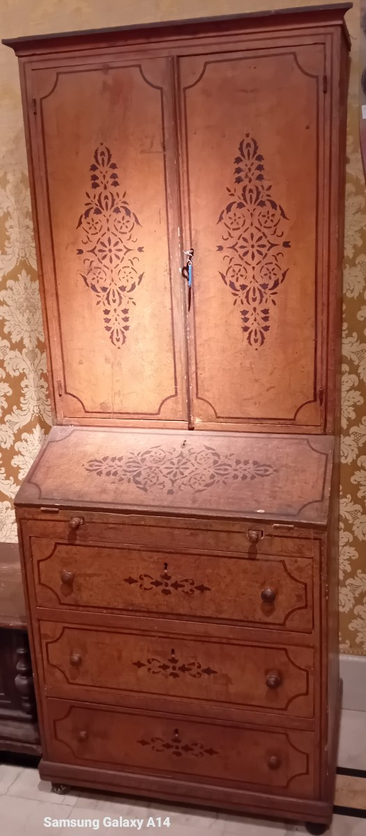 A Small Wooden Trunk, Lacquered And Painted With Stylized Motifs