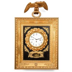 horloge murale à pendule empire en bois doré antique