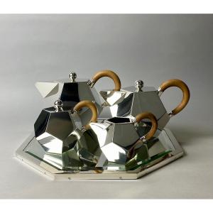 A Rare Modernist Pentagonal Coffee And Tea Service In Silver.