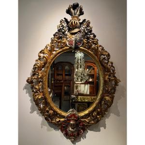 An Oval Mirror In The Neo-baroque Style From The Late 19th Century, Dated 1898