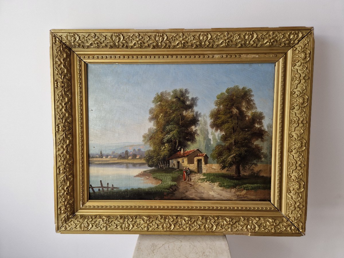 Peinture à l'huile ancienne du XIXe siècle représentant un paysage fluvial, signée Lambert.