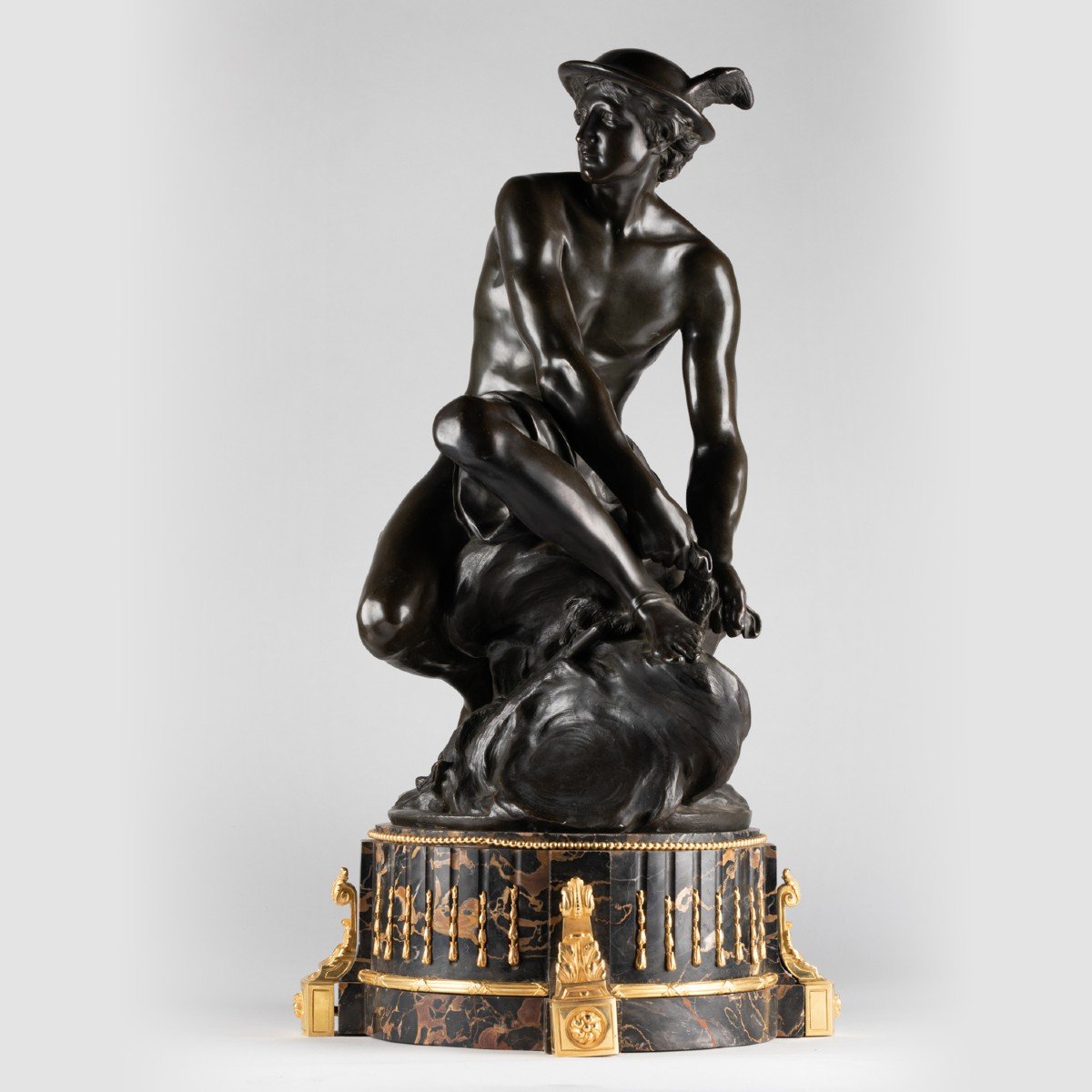 D'après  Jean Batiste Pigalle (1714-1785), Bronze, Mercure attachant ses talonnières, XIXe