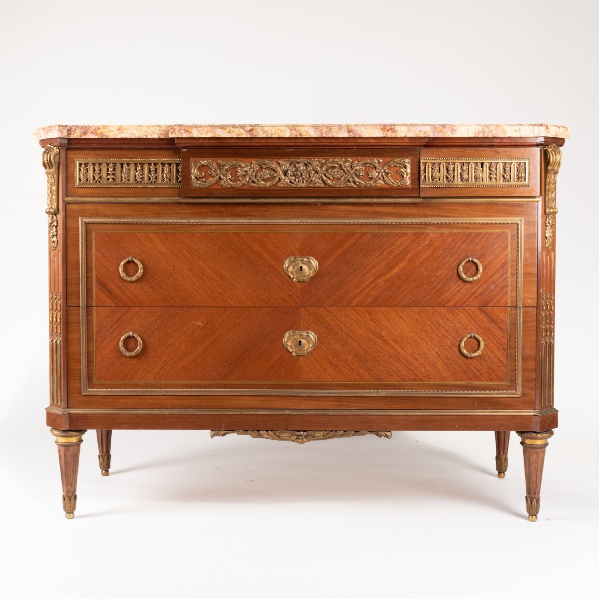 Commode de style Louis XVI en bois de placage, XIXe