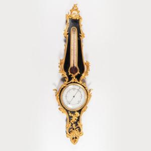 Baromètre de style Régence, âme en poirier noirci et bronze doré, XIXe