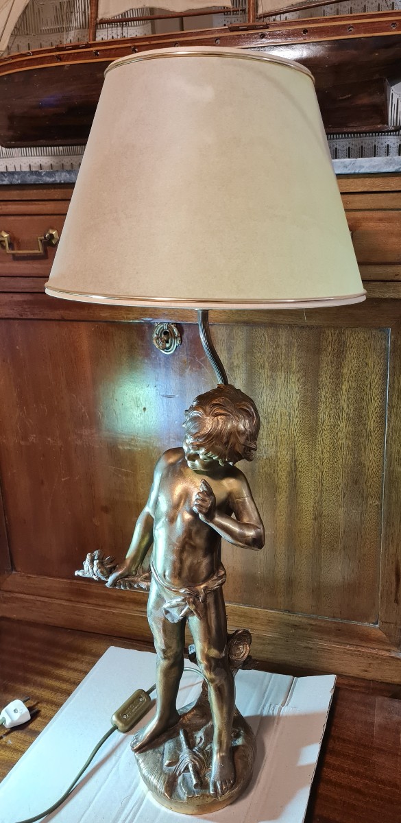 Sculpture Of A Young Boy In Gilded Metal-photo-4