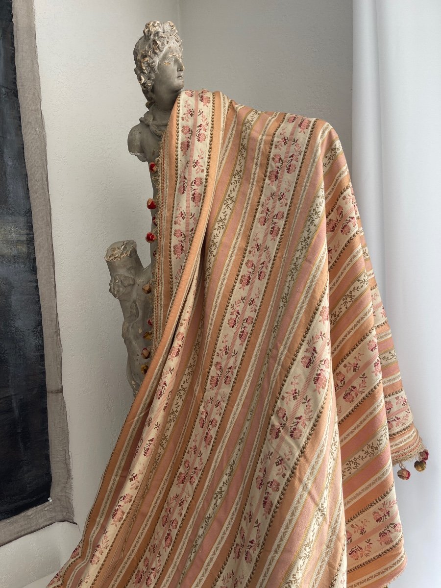 An Old Curtain Trimmings With Pompoms