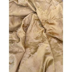 A Champagne Color Curtain With Floral Decor