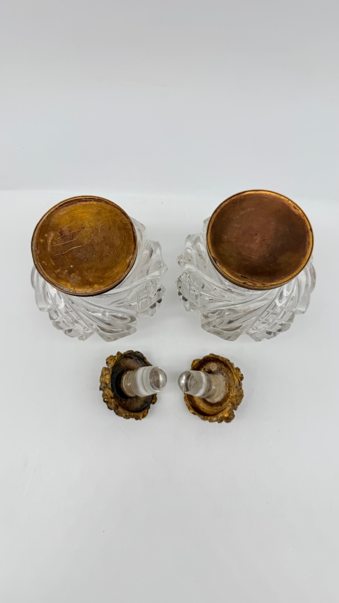 Pair Of Baccarat Perfume Bottles With A Floral Bronze Lids.-photo-2