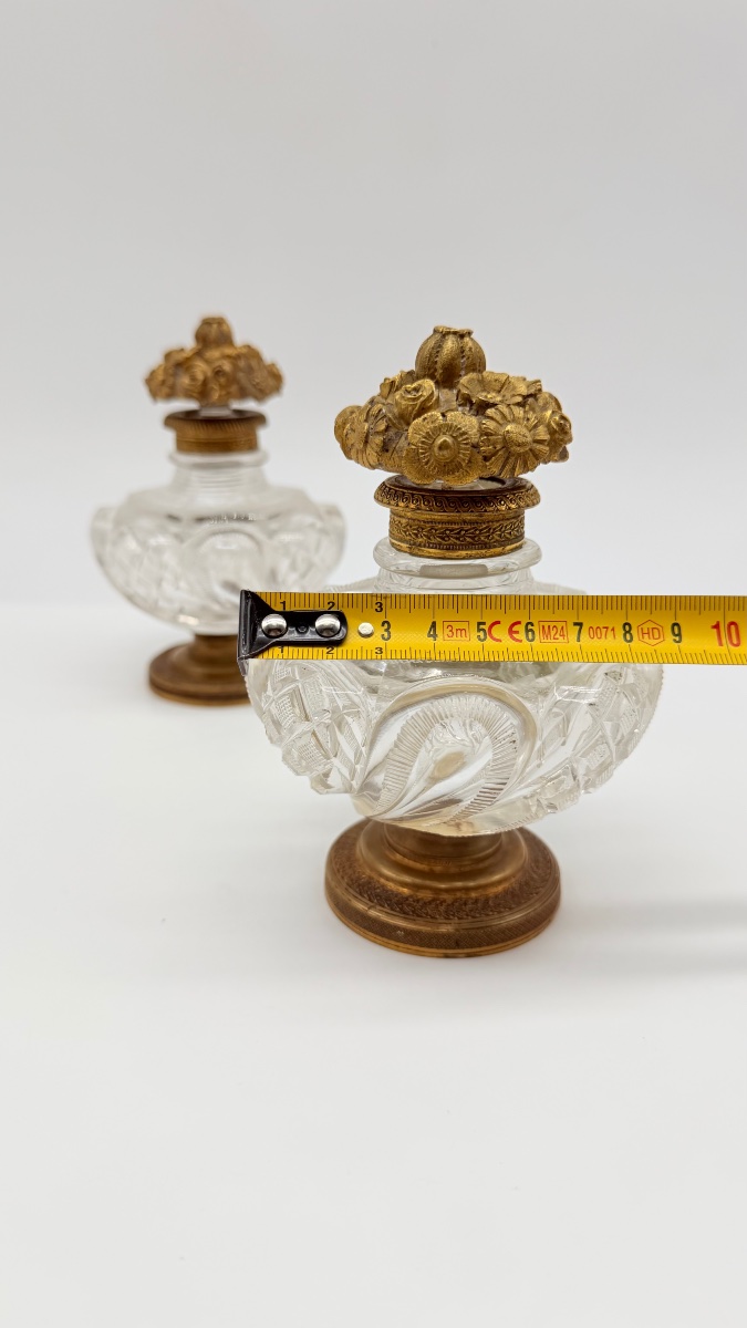 Pair Of Baccarat Perfume Bottles With A Floral Bronze Lids.-photo-5
