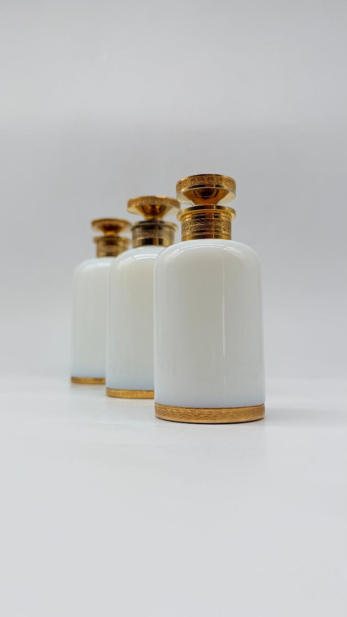 Set de trois flacons de parfum  en opaline irisée « bulle de savon », France, XXe siècle