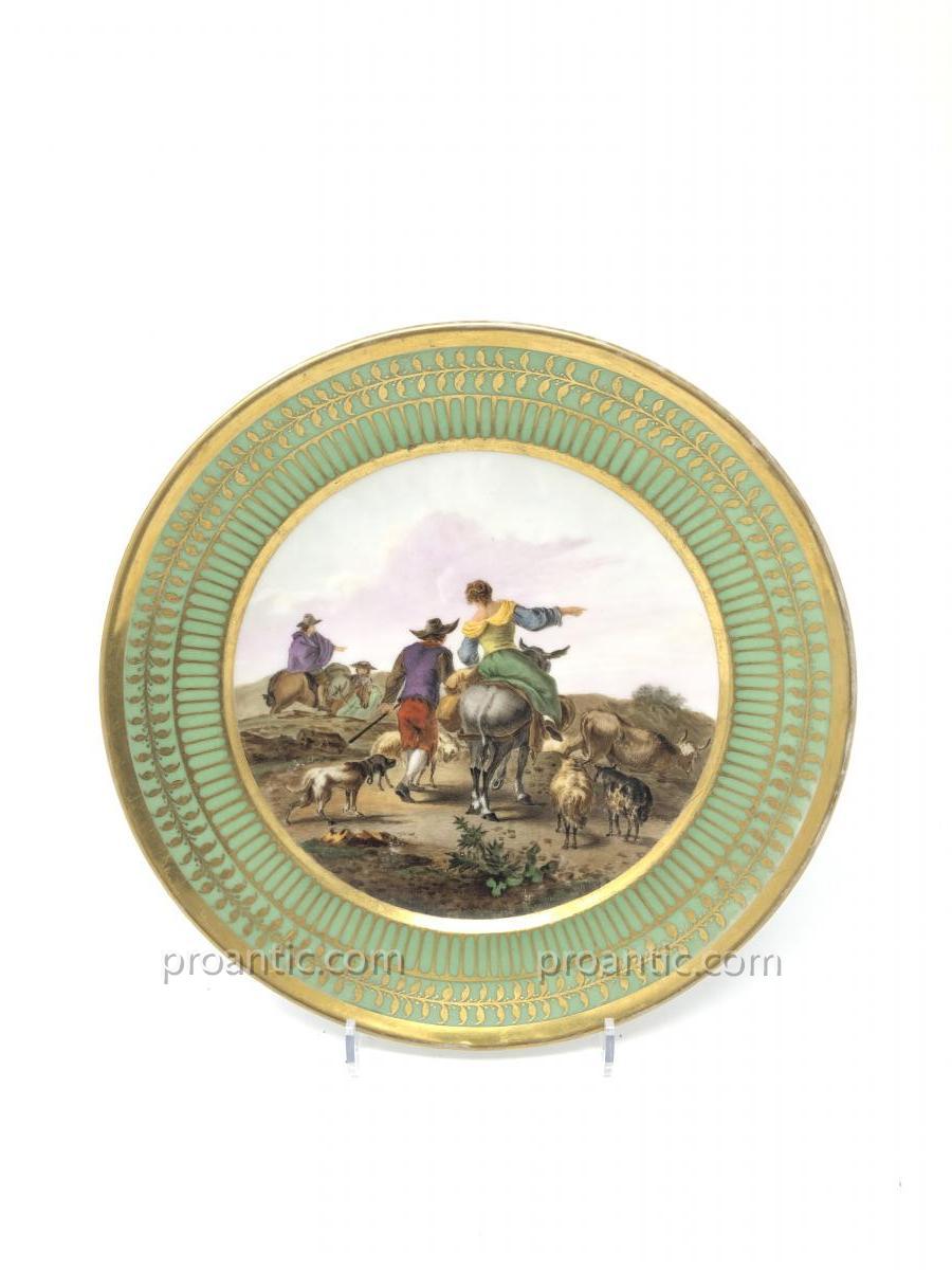 Assiette en Porcelaine de Paris attribué à Dagoty marli vert Empire et scène flamande peinte 