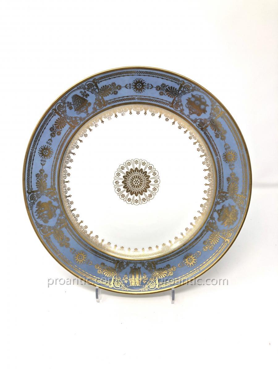 SEVRES Assiette En Porcelaine De Sèvres à fond bleu agate d'époque Louis Philippe