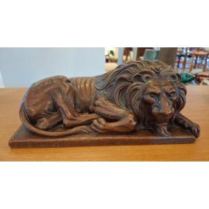Reclining Lion Carved In Wood 