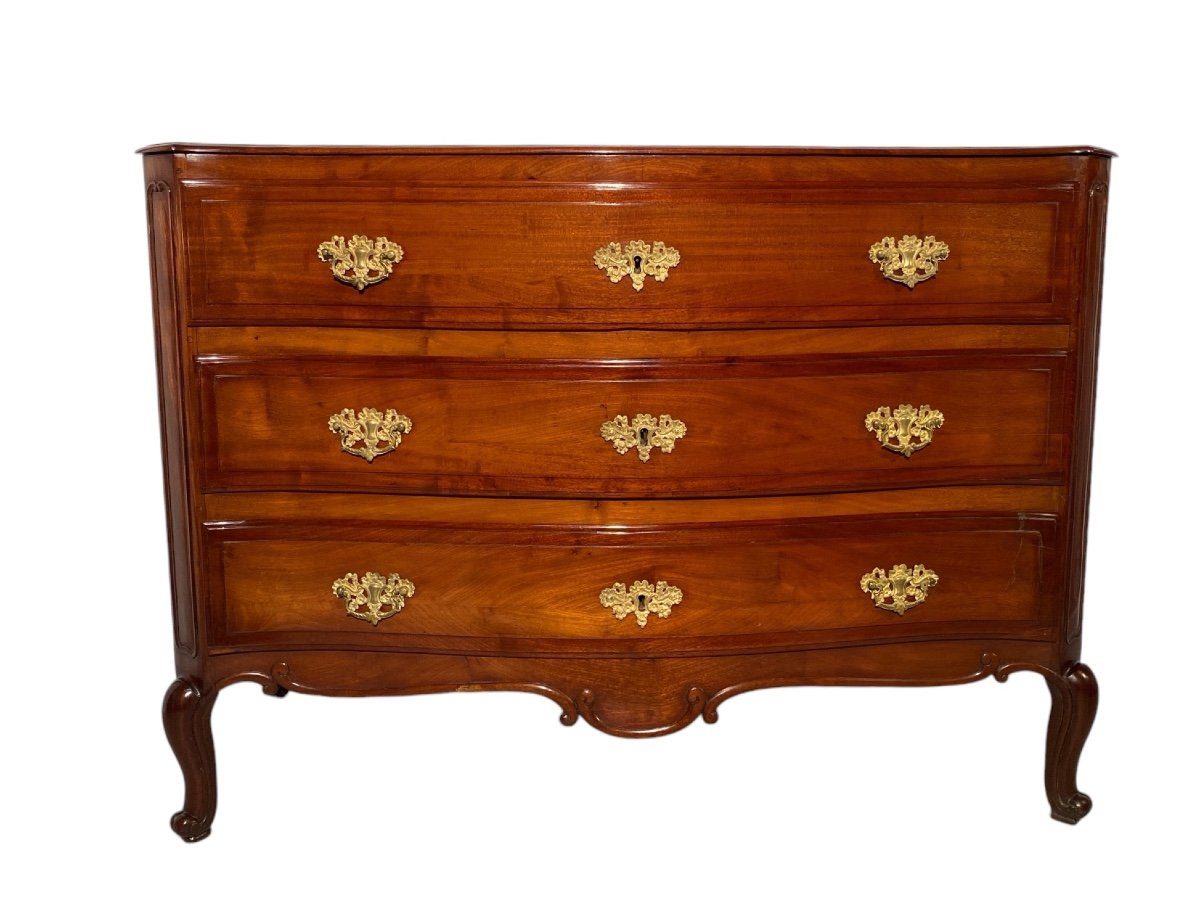 Commode In Molded Mahogany, Curved In Front, Probably English Work From The Eighteenth Century.