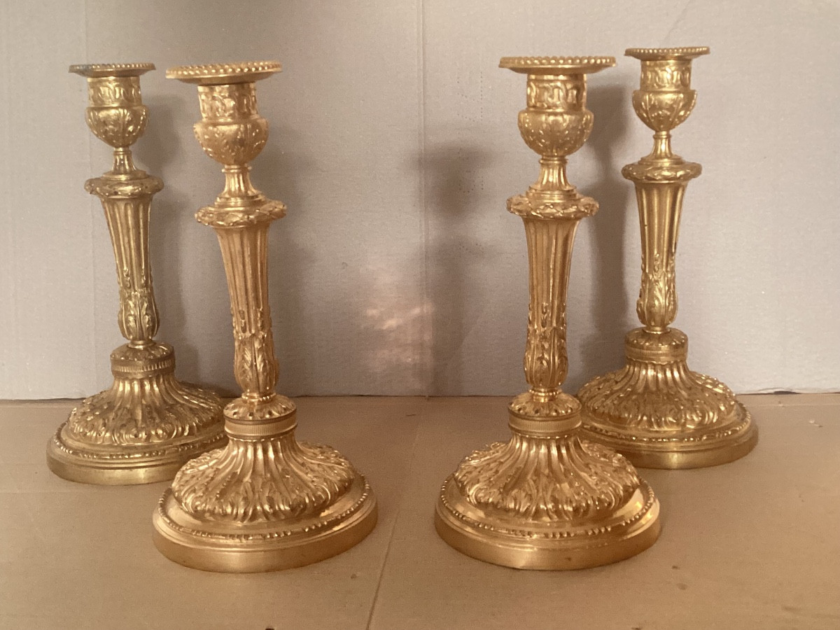 Meeting Of Four 18th Century Candlesticks 
