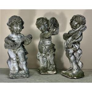 Set Of 3 Putti Musicians In Stone.