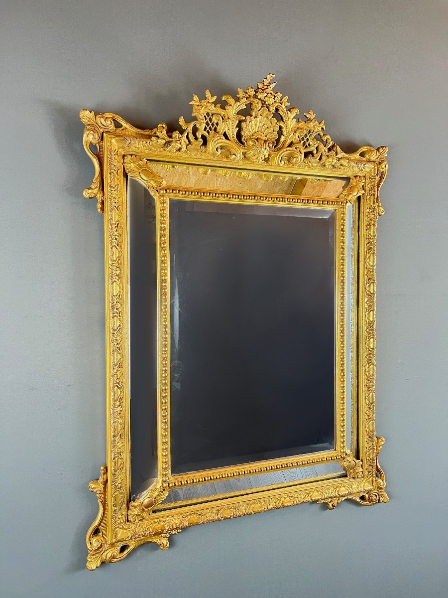 Grand miroir à fronton en bois doré, XIXe siècle