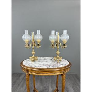 Paire de candélabres à trois lumières en bronze,  XXe siècle
