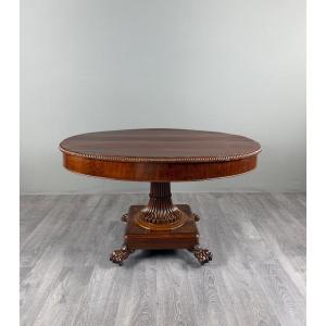 Table ovale de style Empire à pied central, XIXe siècle