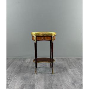 Guéridon de style Louis XVI en acajou et bronze doré, XXe Siècle