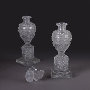 Le Creusot, Circa 1830—a Pair Of Large, Lidded Bottles Made Of Cut Crystal—charles X