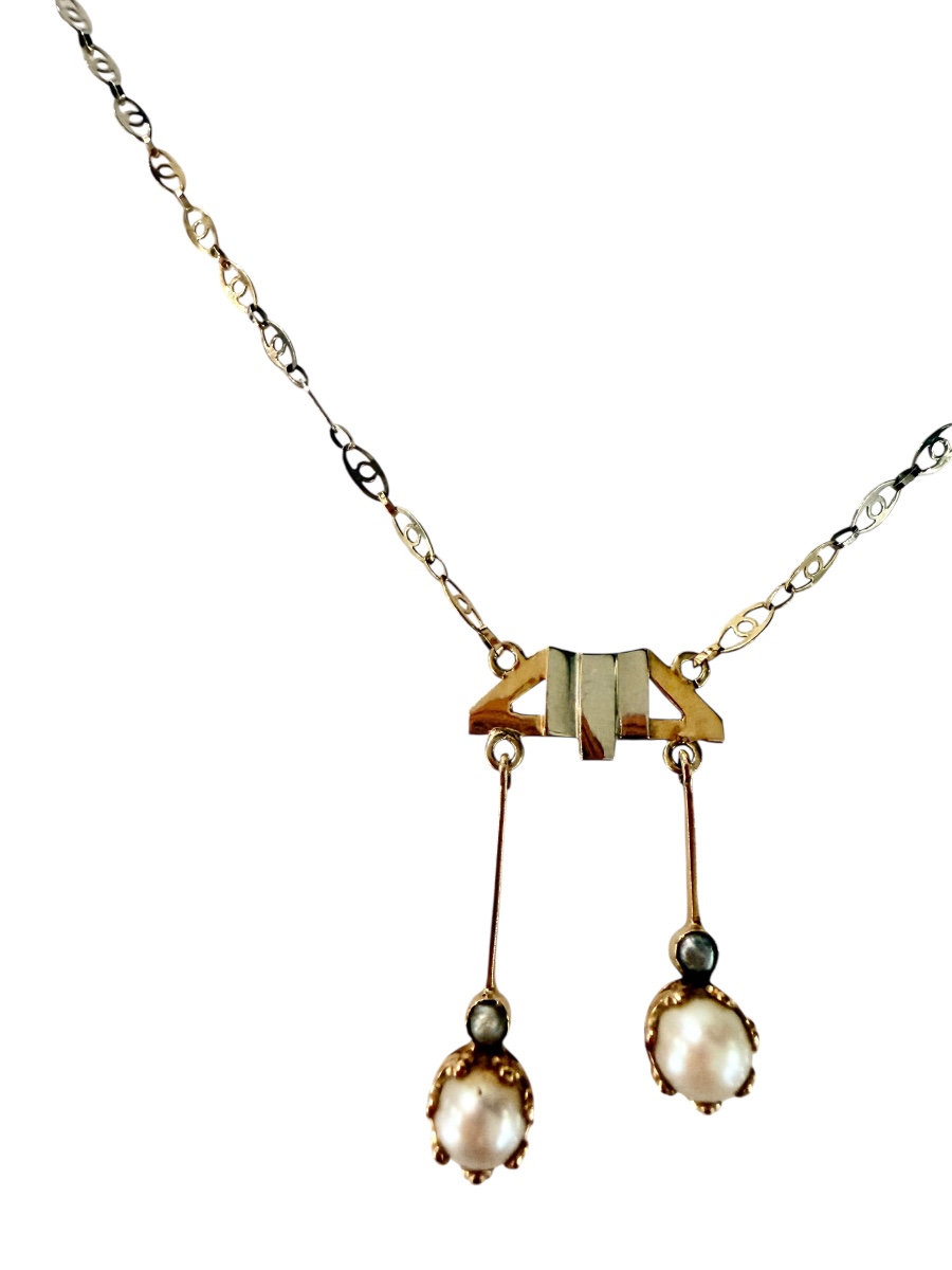 A Necklace Described As "negligee-like," Made Of Two-tone Gold And Adorned With Fine Pearls.