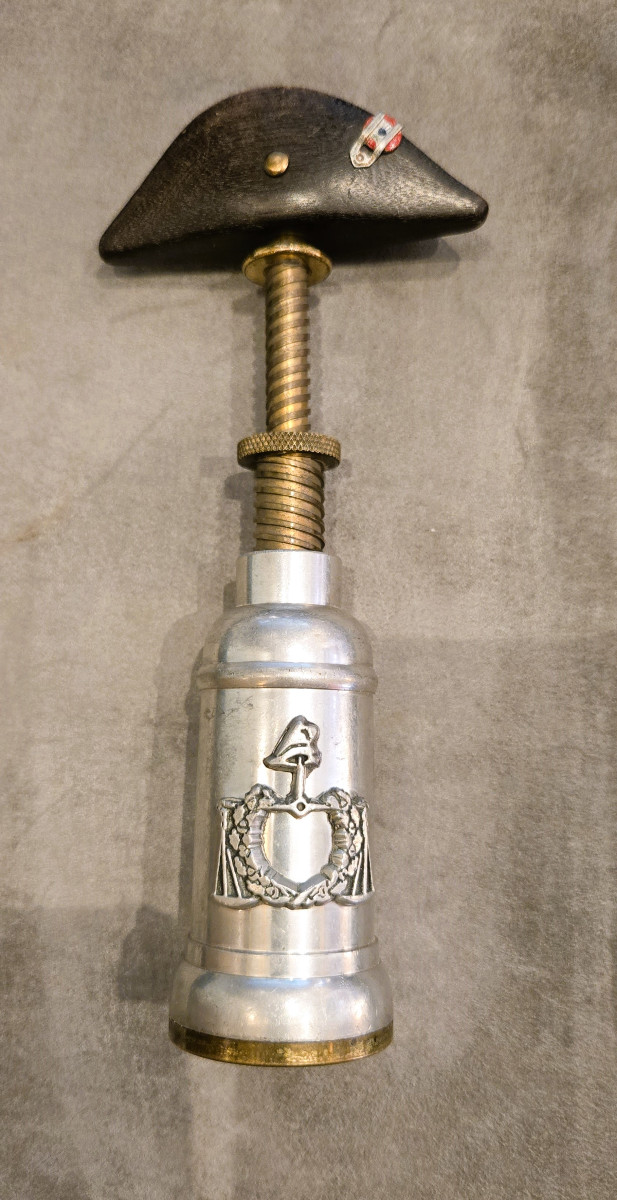 Tire-bouchon à cocarde