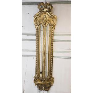 grand baromètre-thermomètre en bois doré début XIXème